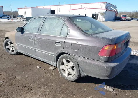 2000 Honda Civic Lx z USA, uszkodzony, nr VIN 1HGEJ6670YL052380